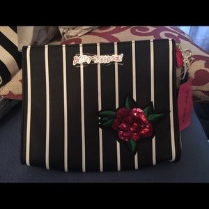 Betsey Johnson oversized cosmetic bag.